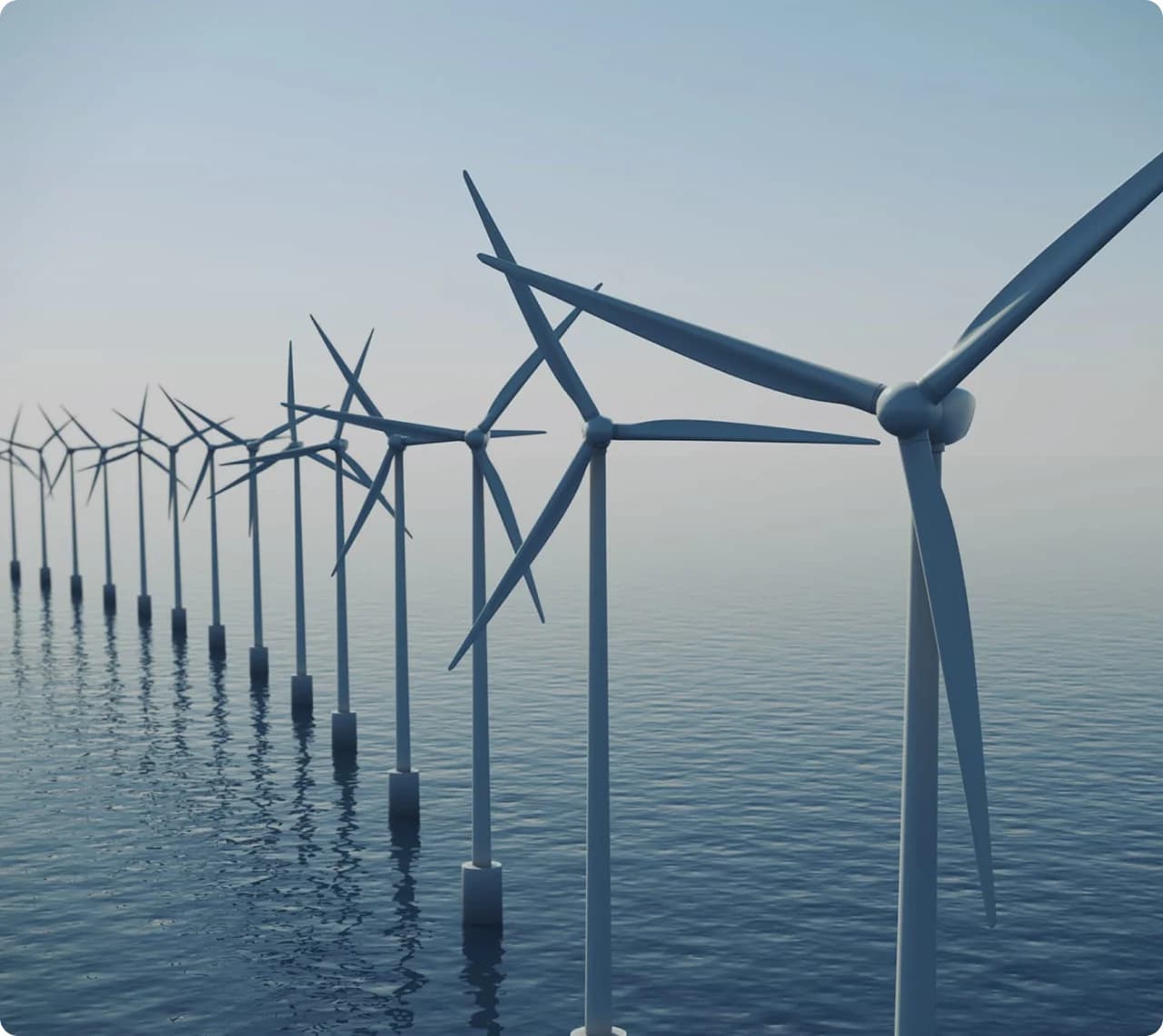Offshore wind turbines extending across the water.