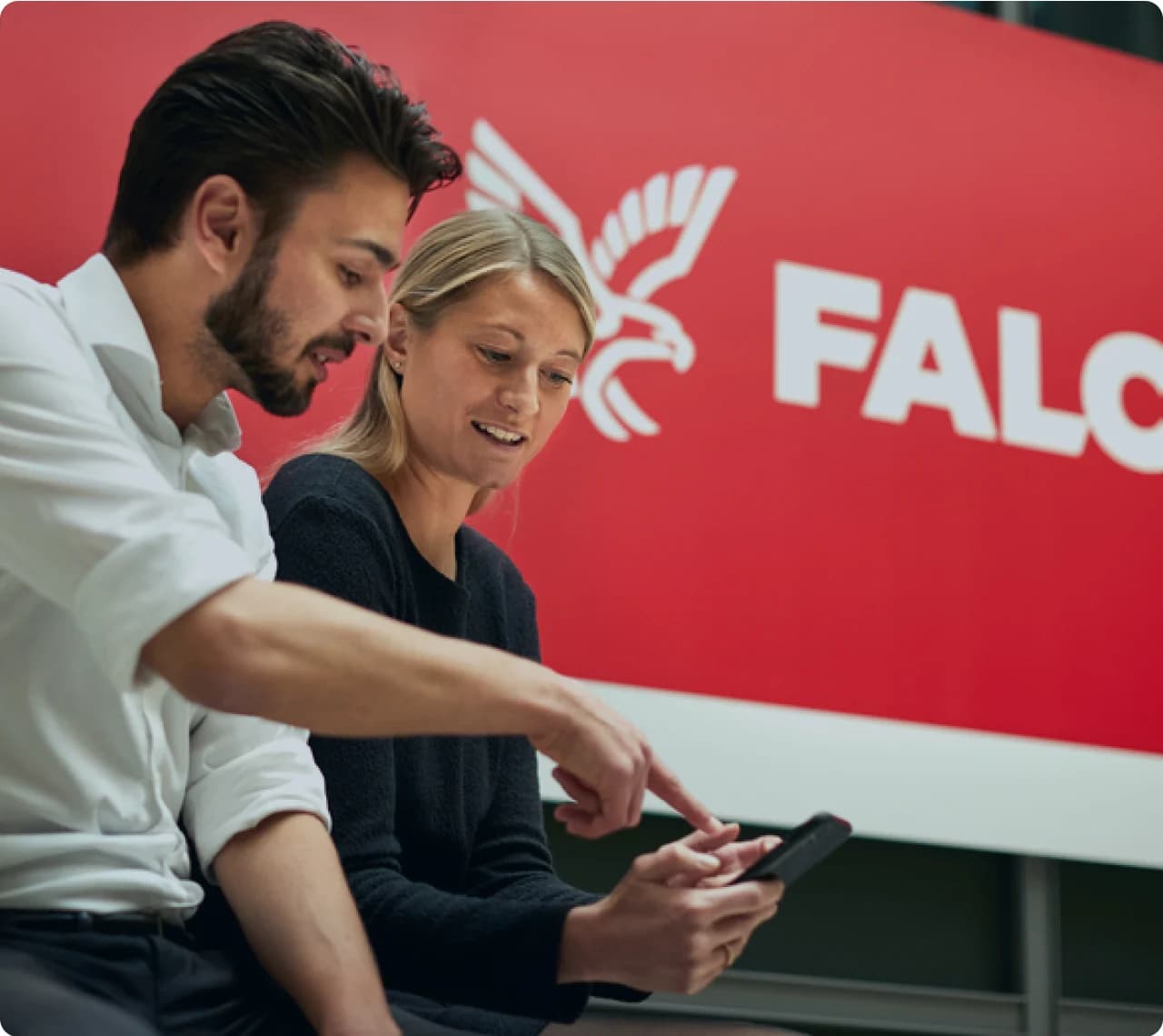 A healthcare professional supporting a patient at Falck.